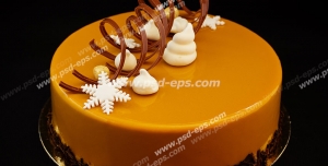 عکس با کیفیت کیک میوه ای با روکش با طعم انبه و تزئین با نوار کاکائویی