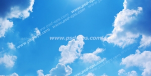 عکس با کیفیت آسمان آبی همراه با ابرهای سفید و نور خورشید