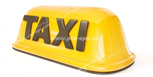 عکس با کیفیت علامت زرد رنگ کابین تاکسی برای بالای خودرو با متن TAXI