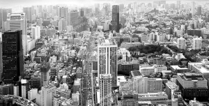 عکس با کیفیت شهری مدرن و پیشرفته با برج ها و آسمان خراش های بلند با رنگ خاکستری