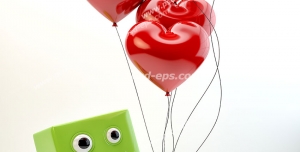 عکس با کیفیت تبلیغاتی آدمک سبز که بادکنک های قلبی قرمز به دست دارد